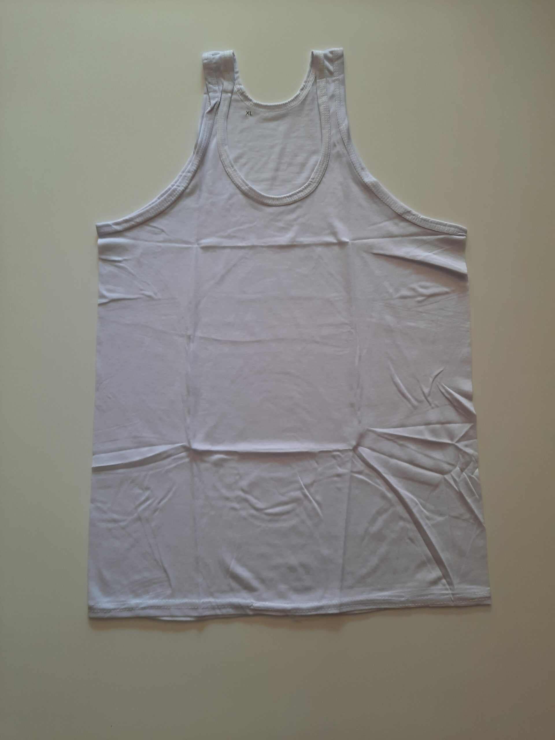 زیرپوش رکابی سفید نازک – سبکی و راحتی برای تمام روز 1 زیرپوش رکابی سفید نازک – سبکی و راحتی برای تمام روز