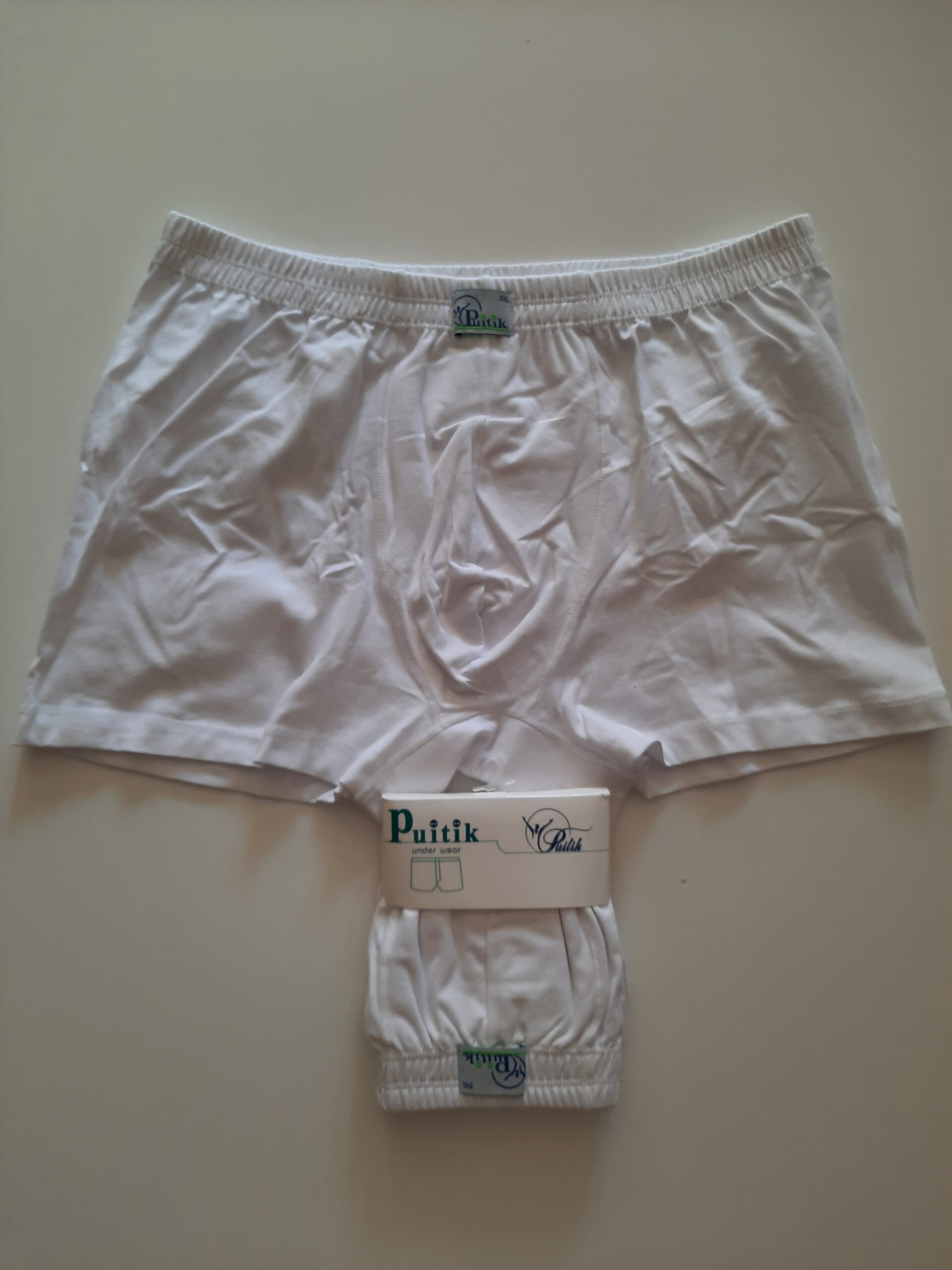 شورت پادار مردانه پویتک (Puitik) – راحتی و طراوت با رنگ سفید 1 شورت پادار مردانه پویتک (Puitik) – راحتی و طراوت با رنگ سفید